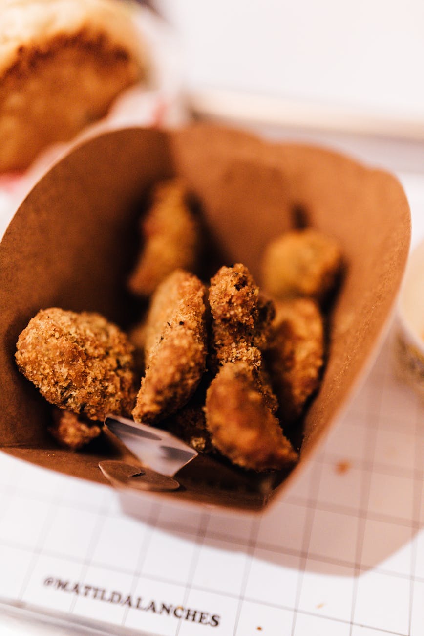 fried food in brown carton